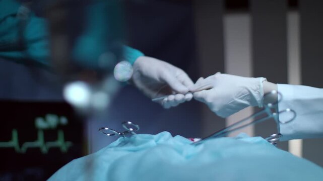 surgeon in operating room with syringe