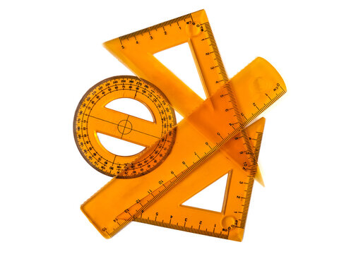 Yellow plastic geometry ruler set on white background, serving as a conceptual background for geometry classes, architectural design, drafting, or school stationery.