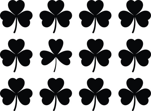 Seamless vector pattern of shamrock silhouettes arranged in uniform rows symbolizing Irish tradition and St Patrick&rsquo;s Day