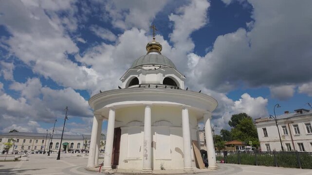 Rotunda pavilion with columns in central square of Torzhok under cloudy sky