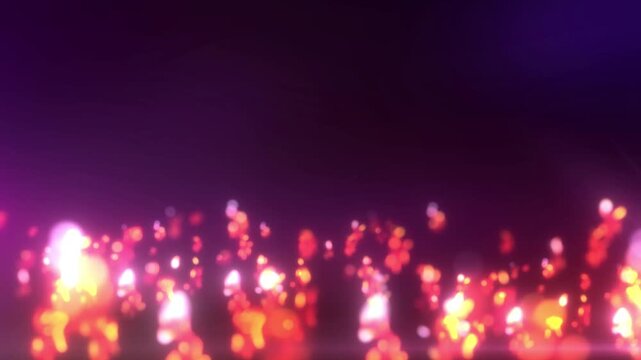 Abstract glowing embers and bokeh lights on dark purple background