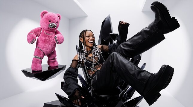Bold Woman in Black Leather Striking Powerful Pose
