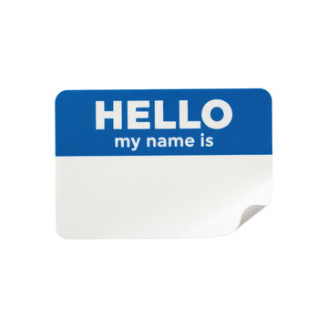 A single adhesive name tag with a cerulean blue header and blank white space, one corner curled upward on a transparent surface, social introduction concept
