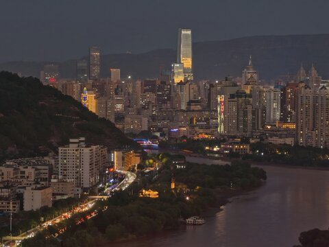 Lanzhou skyline at dusk along the Yellow River, China