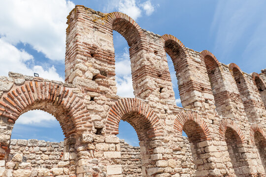 Ancient brick arches and stone walls of the Church of Saint Sophia ruins in Nesebyr, Bulgaria