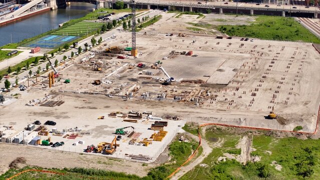 Chicago, Illinois, United States - 20 June 2026: Aerial view of the construction site at Big City Pickle in the South Loop at The 78, featuring heavy machinery and foundation work.