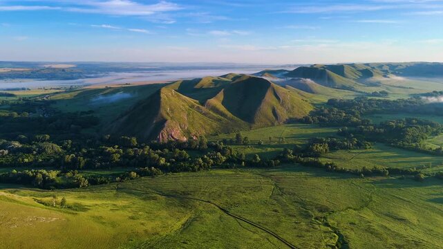 Andreevskie Shishki&mdash;velvety hills on the border with Bashkiria in the Orenburg region&mdash;at dawn, shrouded in mist.
