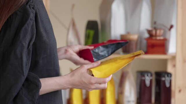 Customer Comparing Coffee Products Before Purchase, Evaluating Product Information And Ingredients To Make Informed Consumer Choice In Grocery Store, Product Comparison Concept