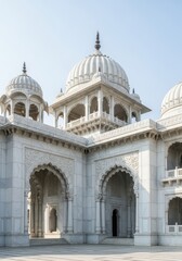 Fototapeta premium Ornate white marble architecture featuring classical Asian domes, arched entryways, and intricate stone carvings against a clear sky, imperial, ancient, shrine