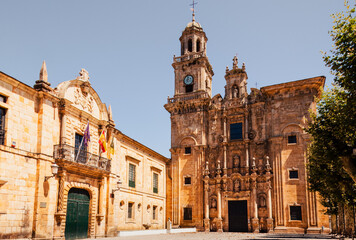 Fototapeta premium Time‑Worn Grandeur — Centuries of baroque mastery rising over a quiet Galician square