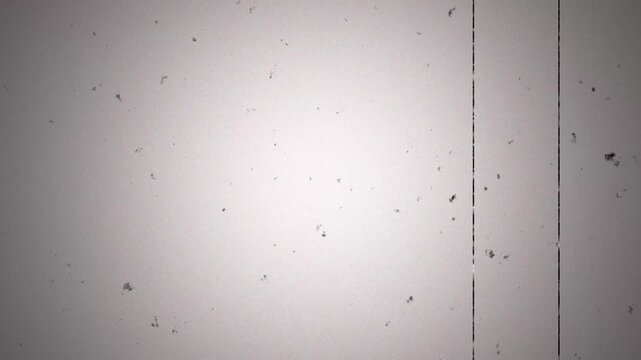 Retro Cinematic Texture with Aged Film Grain and Vertical Scratches 4k video