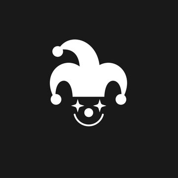 Jester Hat Icon with Happy Clown Face and Sparkling Eyes on Black Background