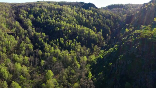Southern Urals in spring: the Irendyk ridge and the Khudolaz River. Aerial view.