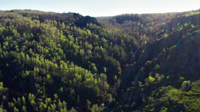Southern Urals in spring: the Irendyk ridge and the Khudolaz River. Aerial view.