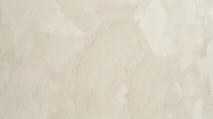Venetian plaster wall texture in warm beige, decorative stucco surface with subtle brush strokes,...