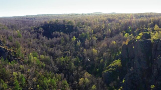 Southern Urals in spring: the Irendyk ridge and the Khudolaz River. Aerial view.