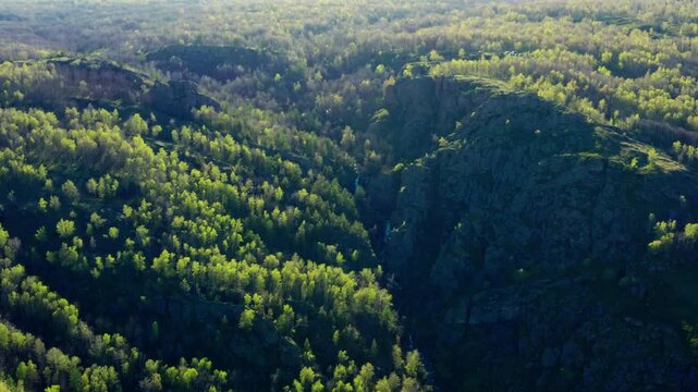 Southern Urals in spring: the Irendyk ridge and the Khudolaz River. Aerial view.