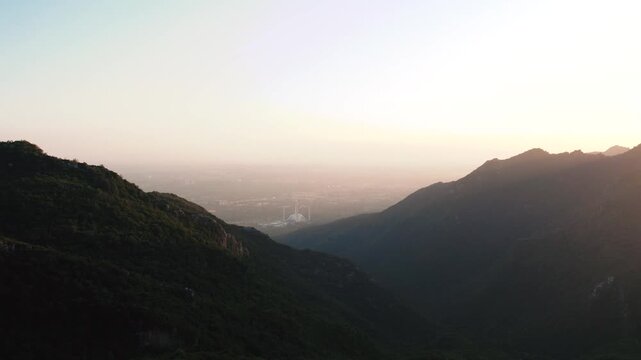 Cinematic Aerial View Faisal Mosque with Margalla Hills Background Islamabad