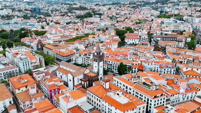 Cathedral of Funchal aerial view with traditional architecture and narrow streets of Funchal city. Madeira