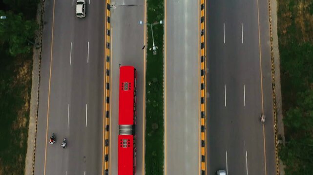 Top Down Aerial View of Metro Bus on City Road | Urban Transport Drone Shot