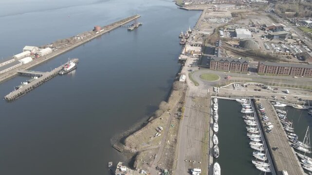Aerial drone view of of harbour, marina and industrial waterfront