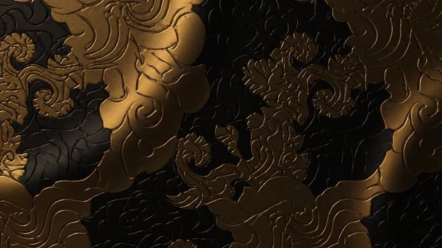 Elegant black and gold floral relief pattern texture.