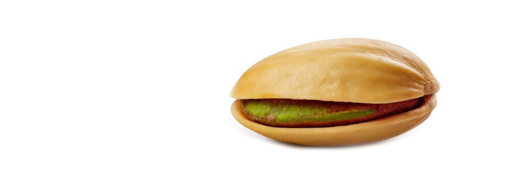 Roasted Pistachio nut on a white background.