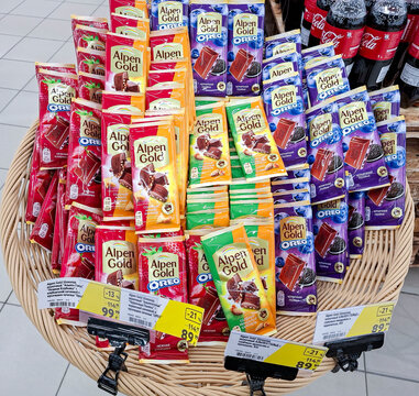 VORONEZH, Russia - April 04, 2026.Wicker basket with Alpen Gold and Alpen Gold Oreo chocolate bars at grocery store in Russia