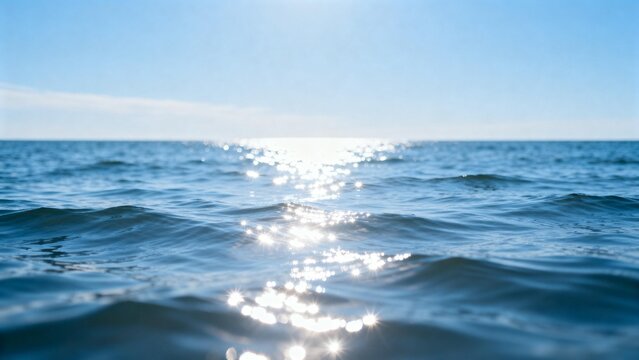 Ocean waves under sunlight