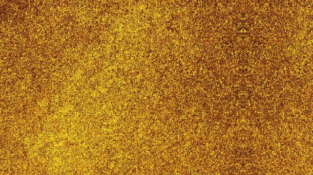 Abstract golden glitter background with shimmering particles and light effects.