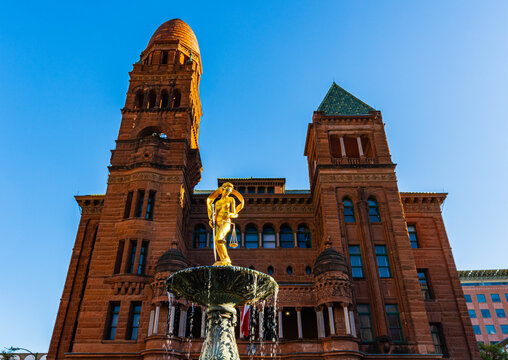 The Lady Justice Statue and The Red Stone of Old World Facade Bexar County Courthouse in The Main Plaze, San Antonio, Texas, USA