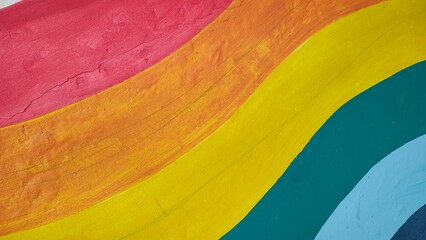 Vibrant abstract mural showing curved stripes in warm and cool colors © MDJAHIDHASAN