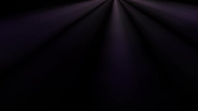 Soft beams of light emerging from darkness creating serene atmosphere