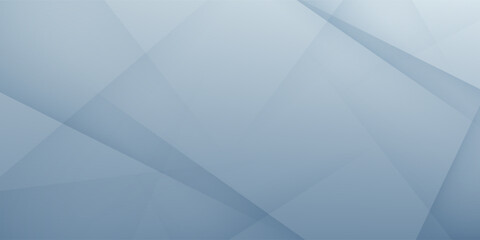 Obraz premium A blue-grey abstract geometric background with overlapping polygonal shapes. A modern minimalist background for corporate presentations, technology banners, or website headers.
