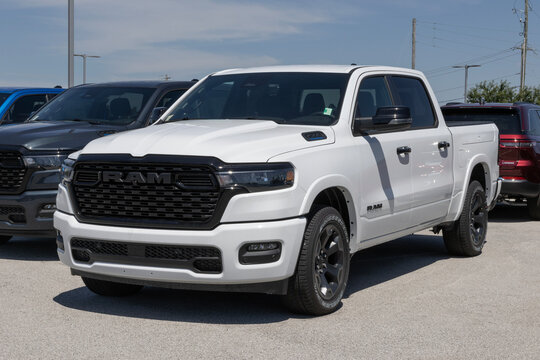 Ram 1500 Big Horn Crew Cab 4X4 truck at a dealership. Ram offers the 1500 with a 3.6L V6 eTorque engine. MY:2026