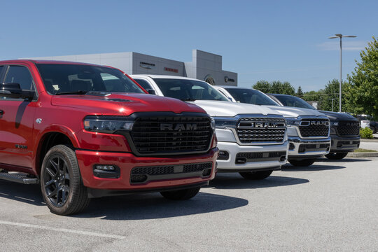 Ram 1500 pickup trucks at a dealership. Ram offers the 1500 with a Hurricane I6, 5.7L HEMI V8 or a 3.6L V6 engine. MY:2026