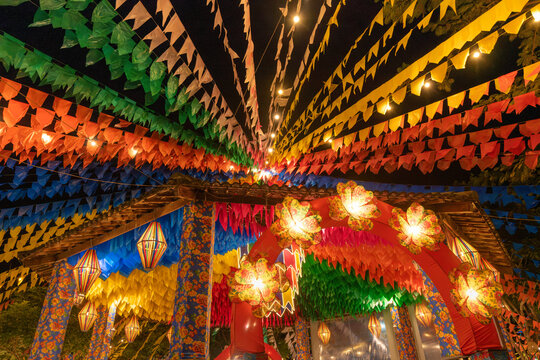 Traditional Brazilian Festa Junina Decoration with Colorful Paper Lanterns and Bunting Flags