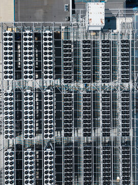 Aerial view of the cooling fan array on the rooftop of the EU North Riga LV DC1 data center in Riga, Latvia.