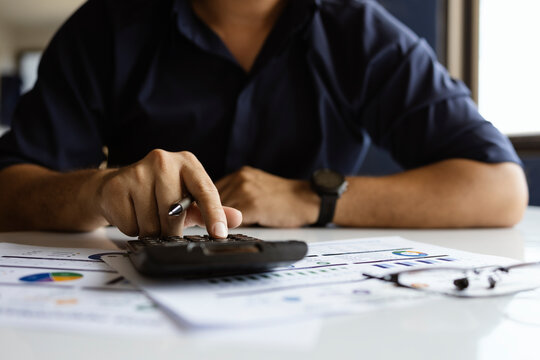 Financial analysis with calculator, interest rate, inflation and investment growth concept