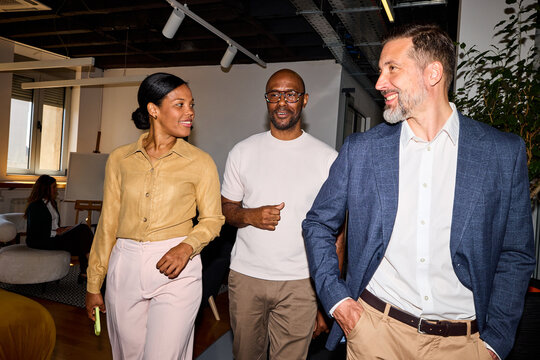 Colleagues navigate the corporate setting.