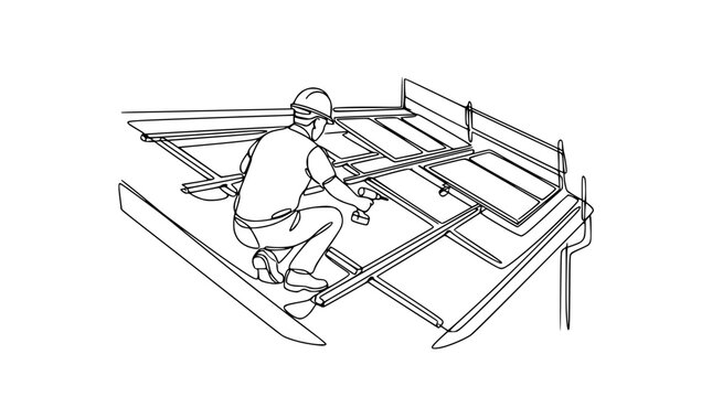 Construction worker installing suspended ceiling grid with drill