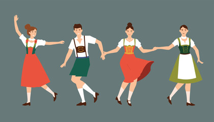 Obraz premium Four people in traditional Bavarian folk costumes dancing and holding hands.