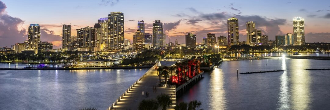 Saint Petersburg Florida skyline panorama on Tampa Bay from above with St. Pete Pier at night in downtown St Petersburg, USA