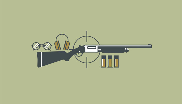 A shotgun with ear protection glasses and ammunition cartridges placed within a target symbol for shooting sports and hunting.