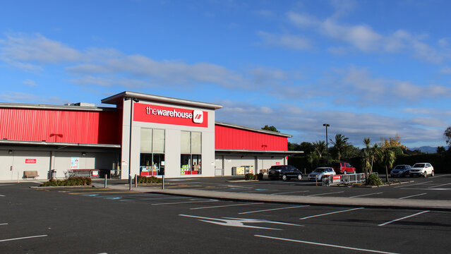 Whitianga, New Zealand - March 6, 2026: Exterior view of The Warehouse department store building and carpark on a sunny day. Editorial Use.