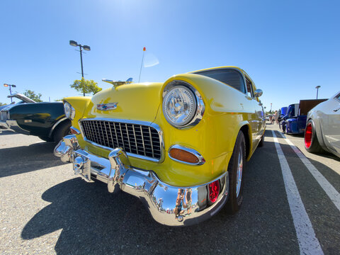 Yellow 1955 Chevrolet Bel Air At Outdoor Car Show