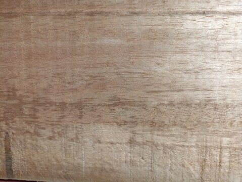 Wood Grain Texture, detailed natural timber surface with warm tones, suitable for backgrounds, furniture mockups, construction themes, and design projects