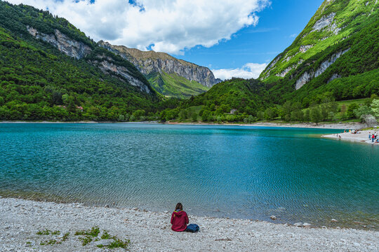 The view of Lake Tenno, a splendid alpine lake nestled between mountains and woods, near Lake Garda, near the town of Tenno, Trentino, Italy - May 2026