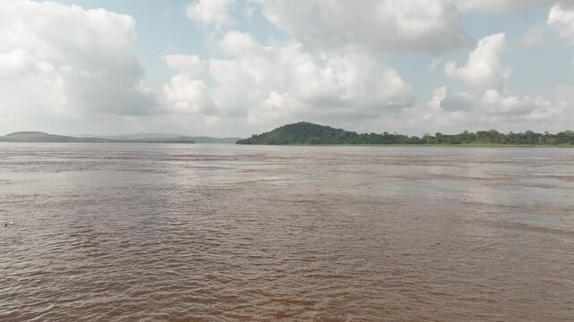 Congo River, DR Congo - forested island and low hills, aerial drone view