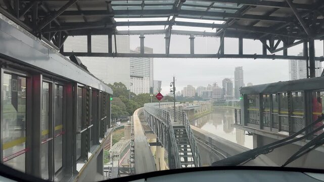 Elevated monorail on São Paulo's Line 17 Gold traveling on a concrete guideway, representing innovative urban transportation and sustainable mobility